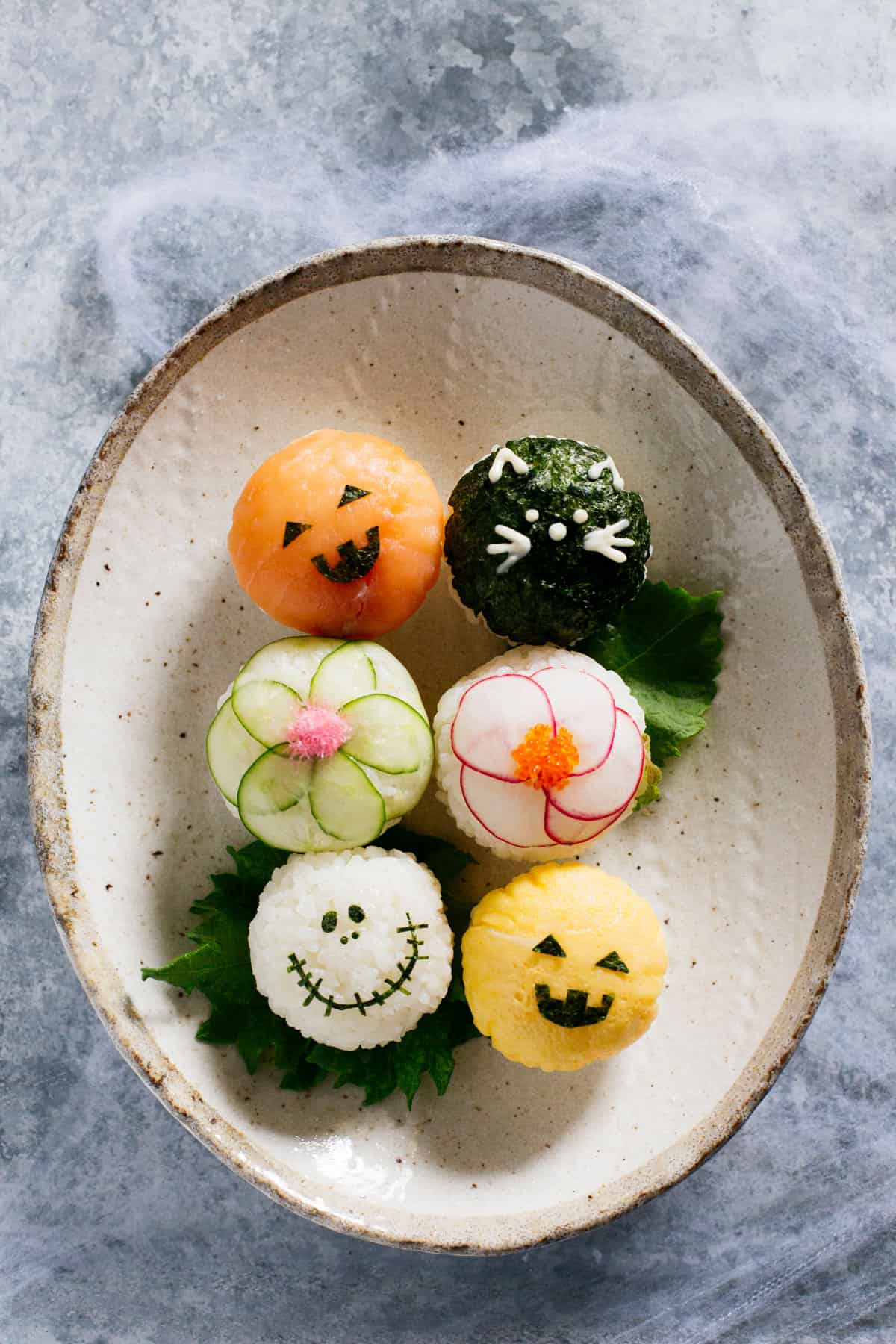 6 halloween temari sushi on an oval plate