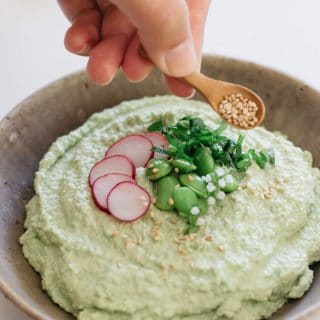 Edamame hummus served in a shallow bowl