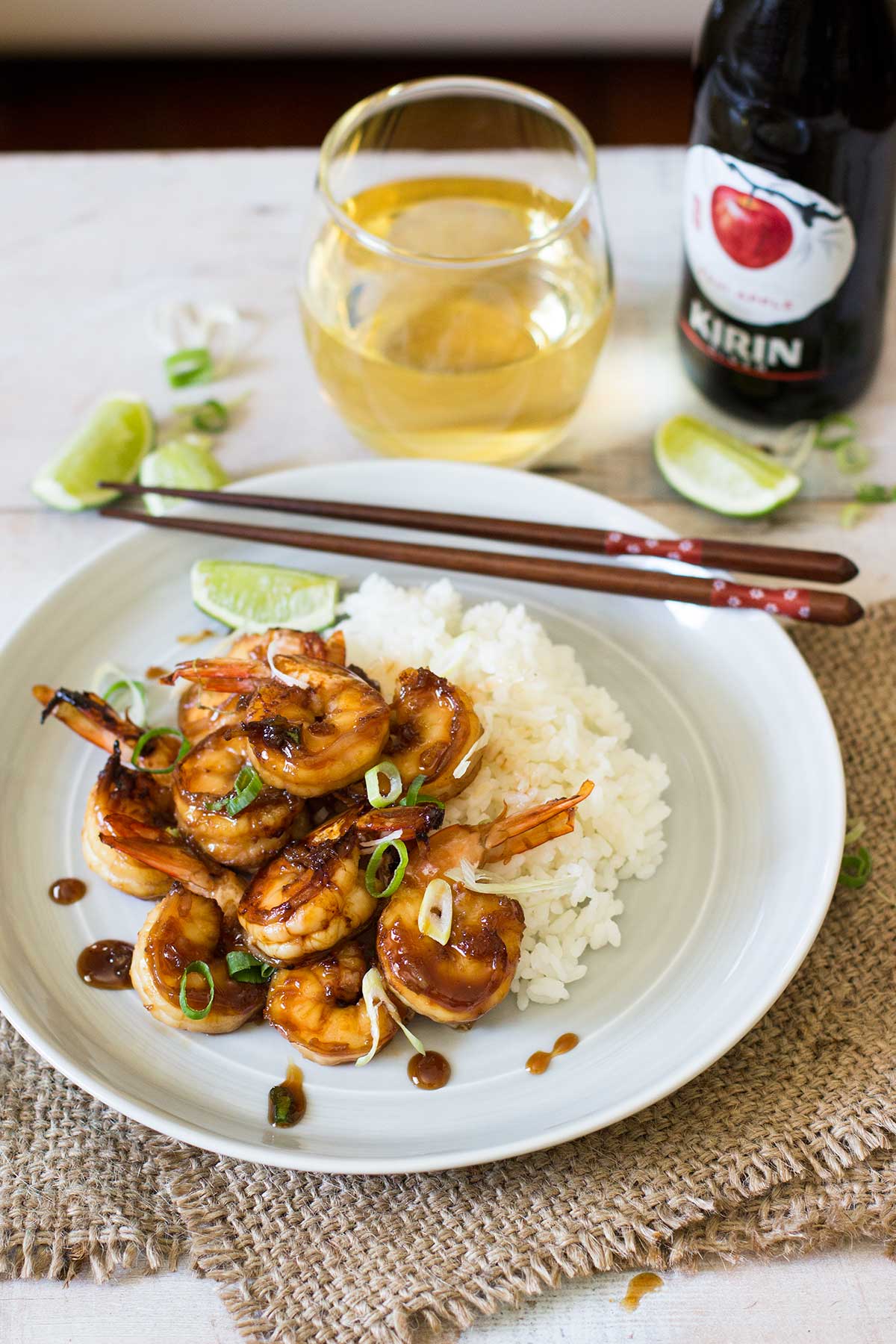 Teriyaki Grilled Prawn on a plate with w white rice and some chopsticks 
