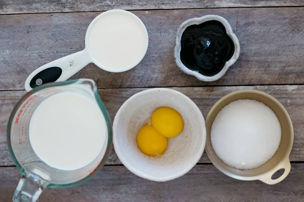 black sesame ice cream ingredients - egg yolk, black sesame paste, milk, sugar and cream