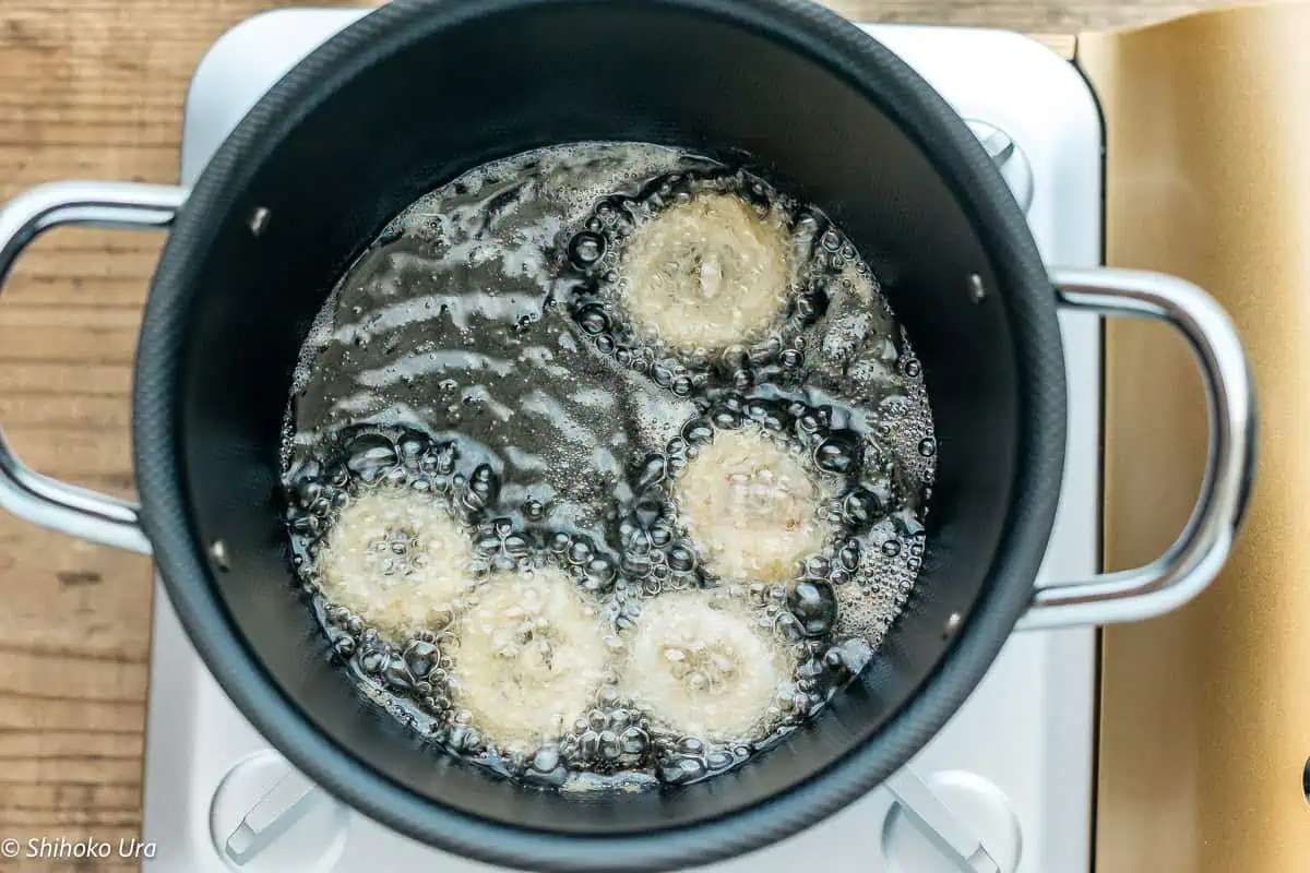 Carefully place the squid into the hot oil. Fry in small batches