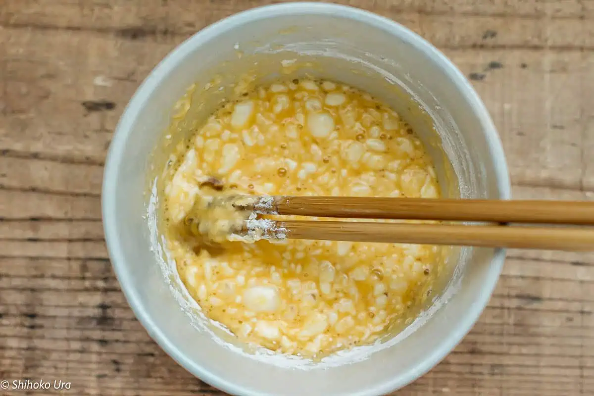 Mix egg, all purpose flour, and water in a large bowl until smooth