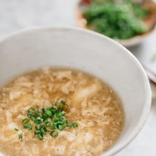 egg drop soup served in a large Japanese pottery bowl