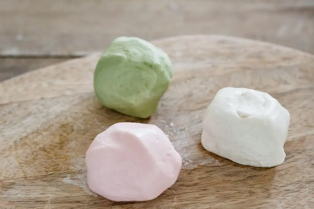 soft pink, light green and white dumplings dough balls