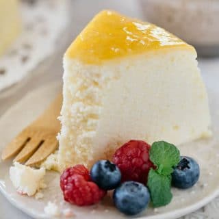 Japanese souffle cheesecake piece served with berries