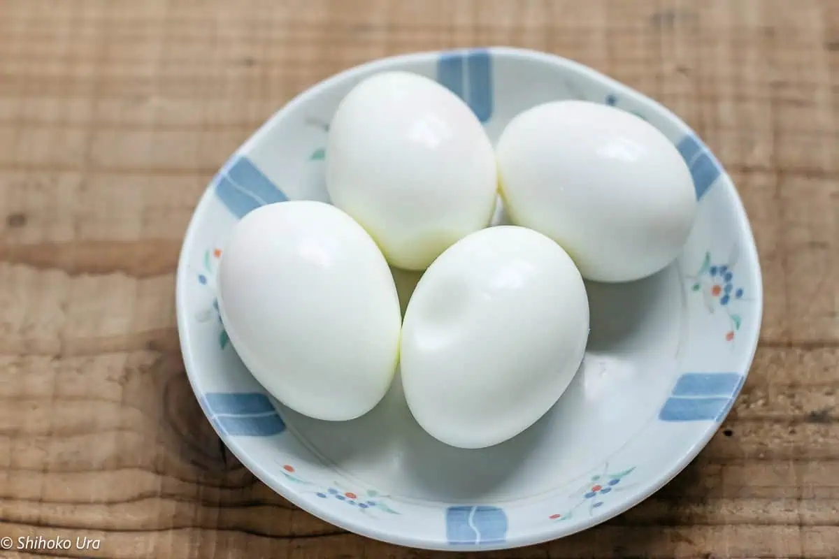 4 hard boiled eggs on a round plate