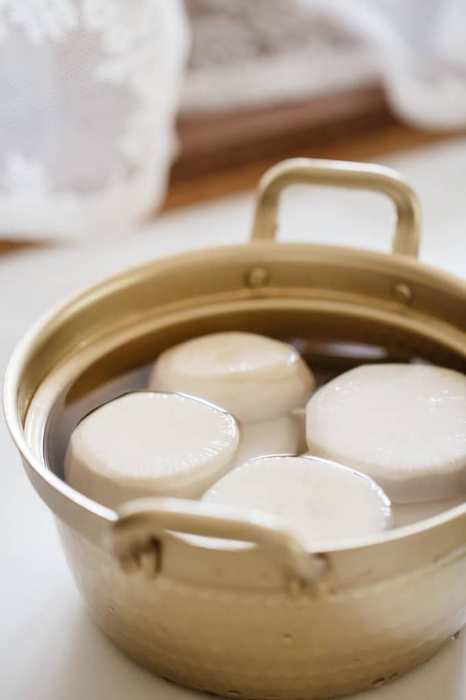 One of oden ingredients-Daikon being prepped in a pot. 