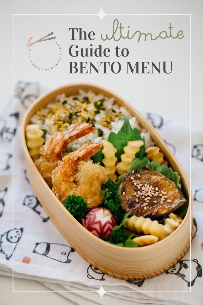 A complete bento in a wooden bento box with rice, deep fried prawns, nasu dengaku and potato chips