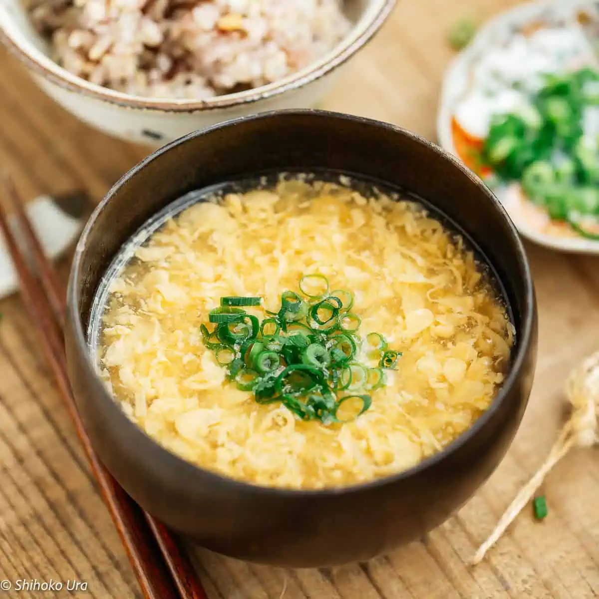 egg drop soup served in a Japanese lacquer bowl