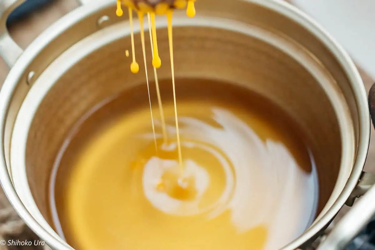 adding egg into the pot