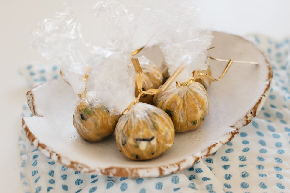 four instant miso balls wrapped with cling wrap