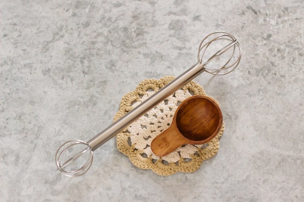 a miso muddler and a wooden table spoon