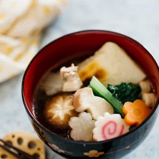 Ozoni mochi soup Kanto style is served in a Japanese lacquered soup bowl