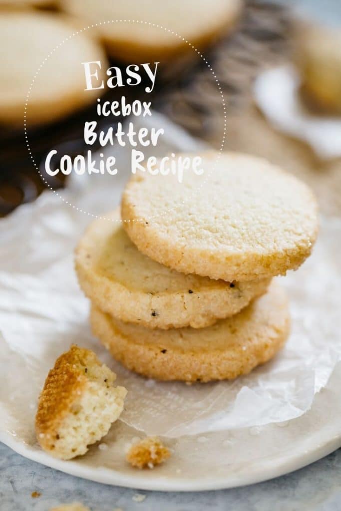 three icebox butter cookies stacked on a white plate