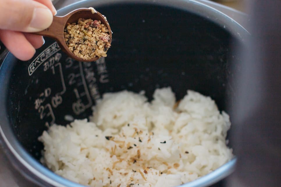 Onigiri Seasoning sprinkled into a rice cooker