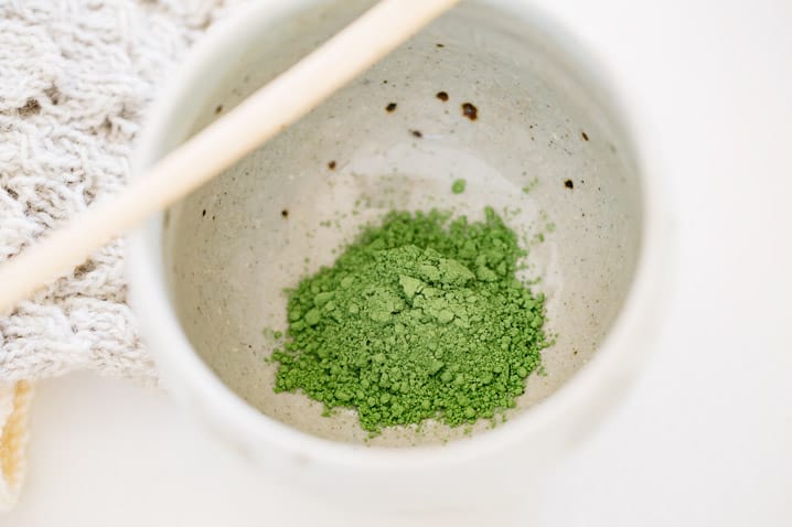 Matcha green tea powder in a matcha green tea latte serving bowl