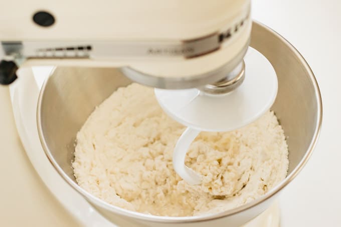 MIxing ingredients and kneading with a stand mixer