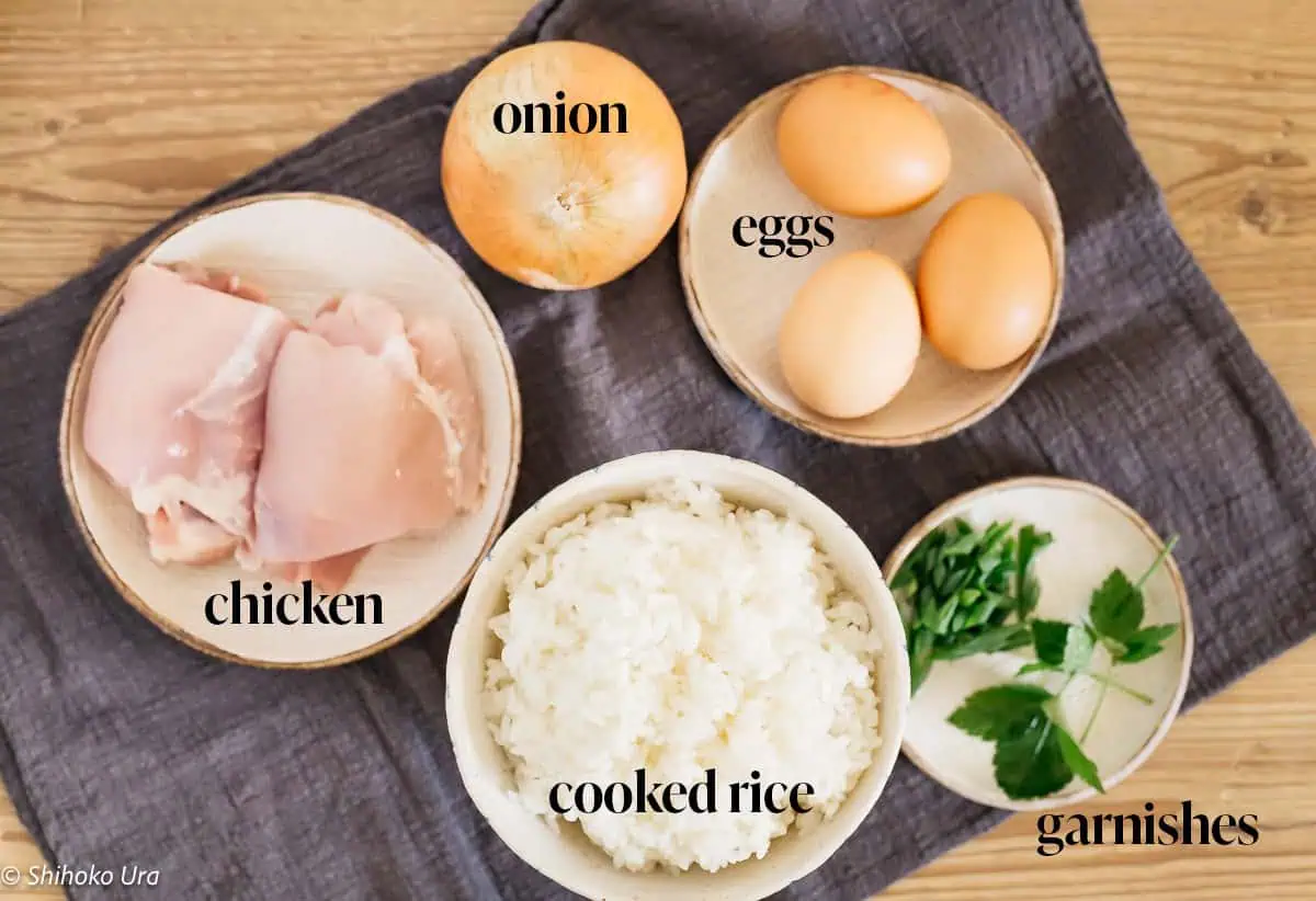 3 eggs, chicken thigh, cooke rice and garnishes