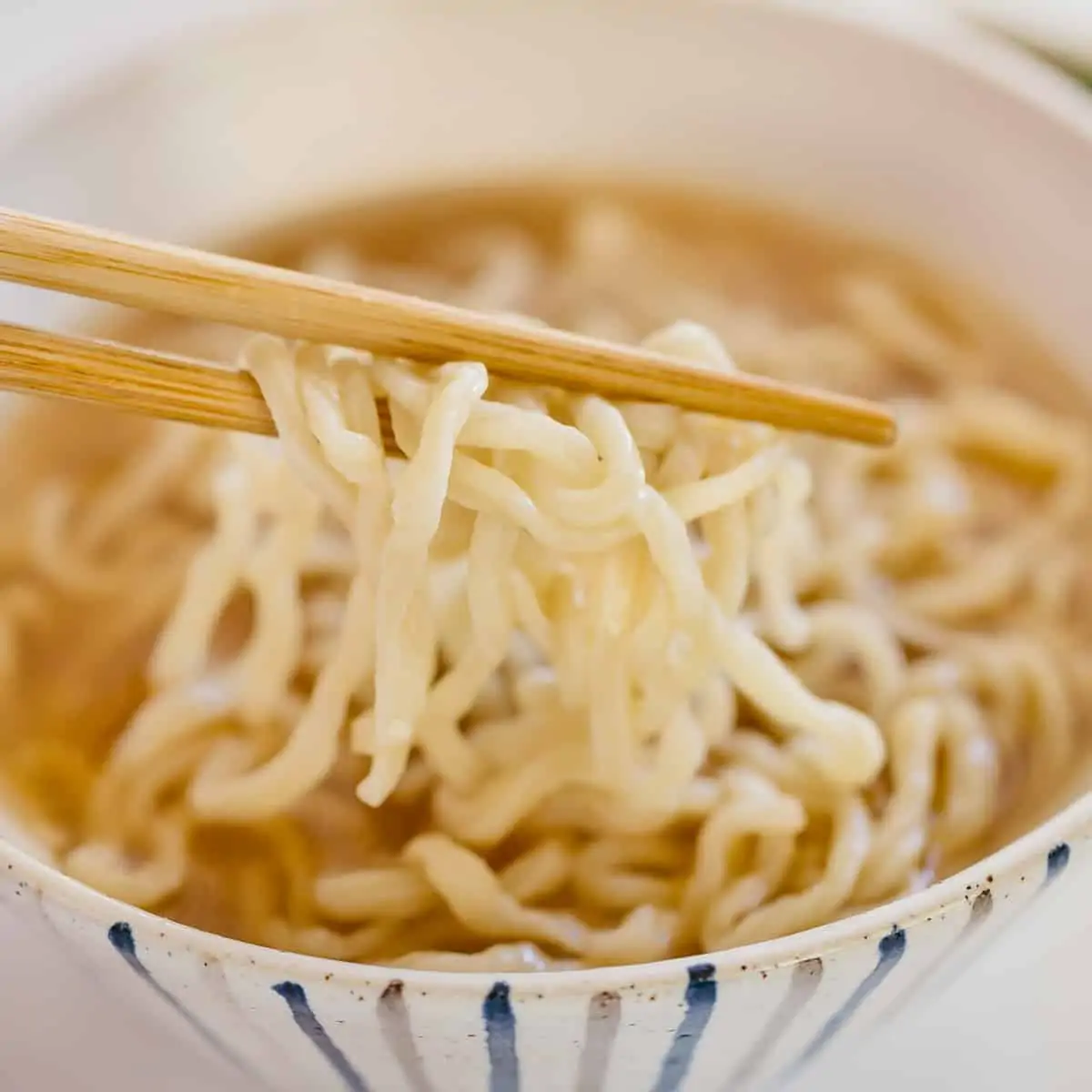 homemade ramen noodles cooked and served with ramen broth