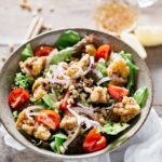 kara age chicken salad served in a round ball