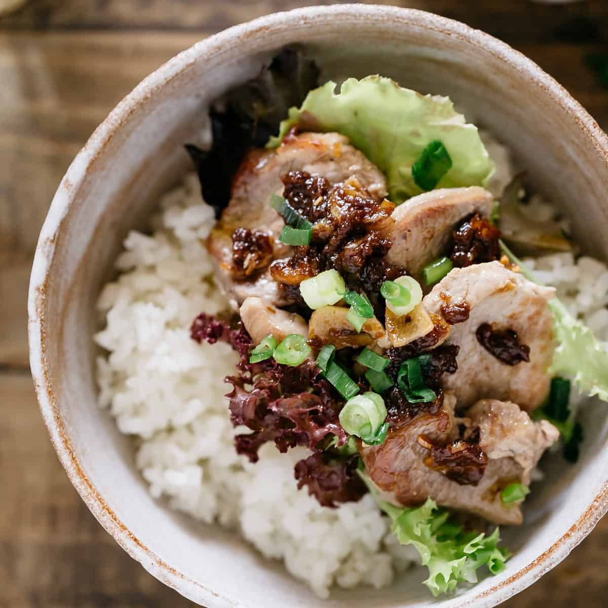 Japanese rice bowls with pork fillets served in a Japanese rice bowl