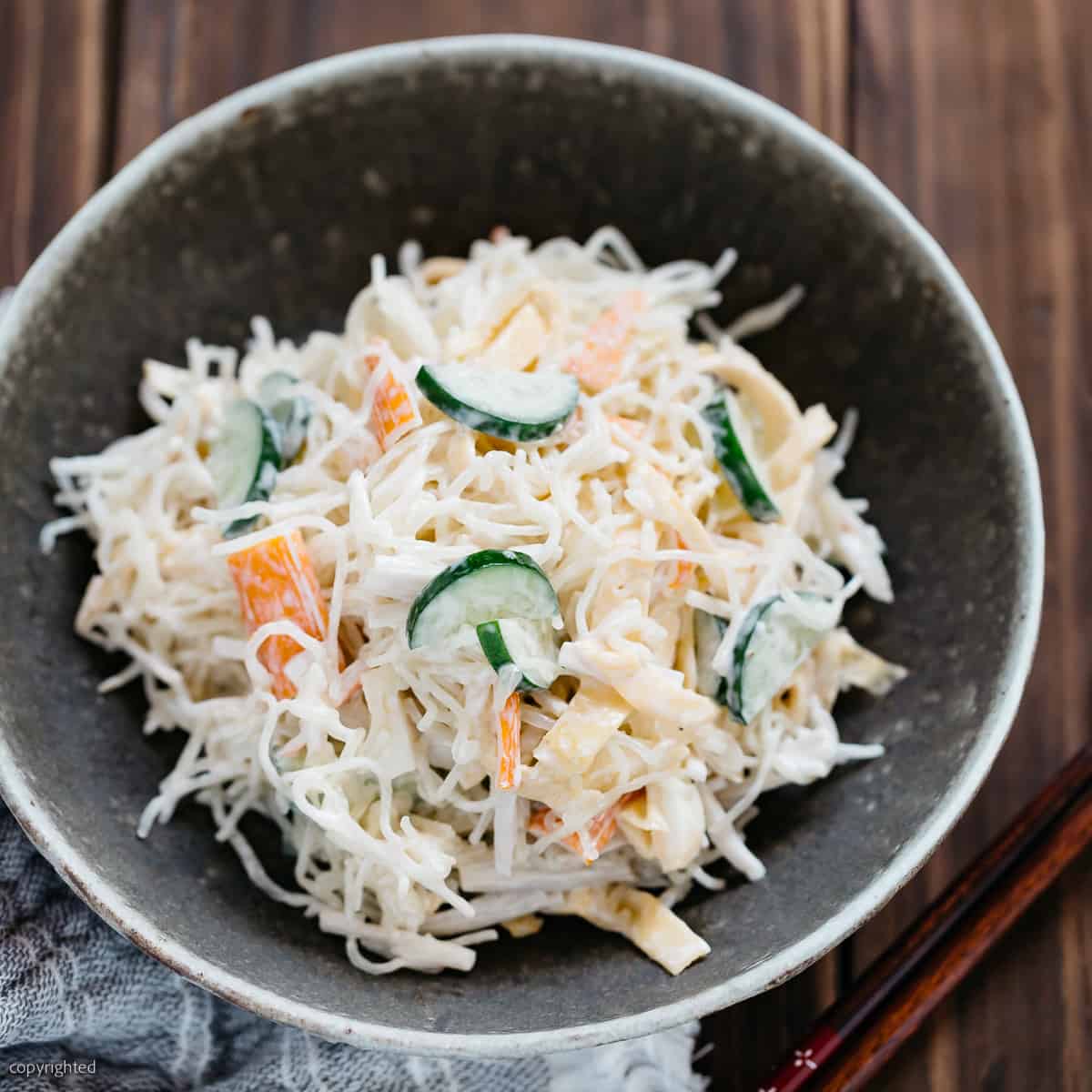 Kelp noodle salad served in a shallow round bowl