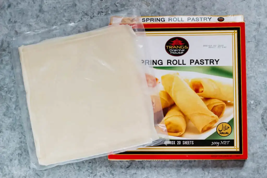 Spring roll wrappers and package on a kitchen bench