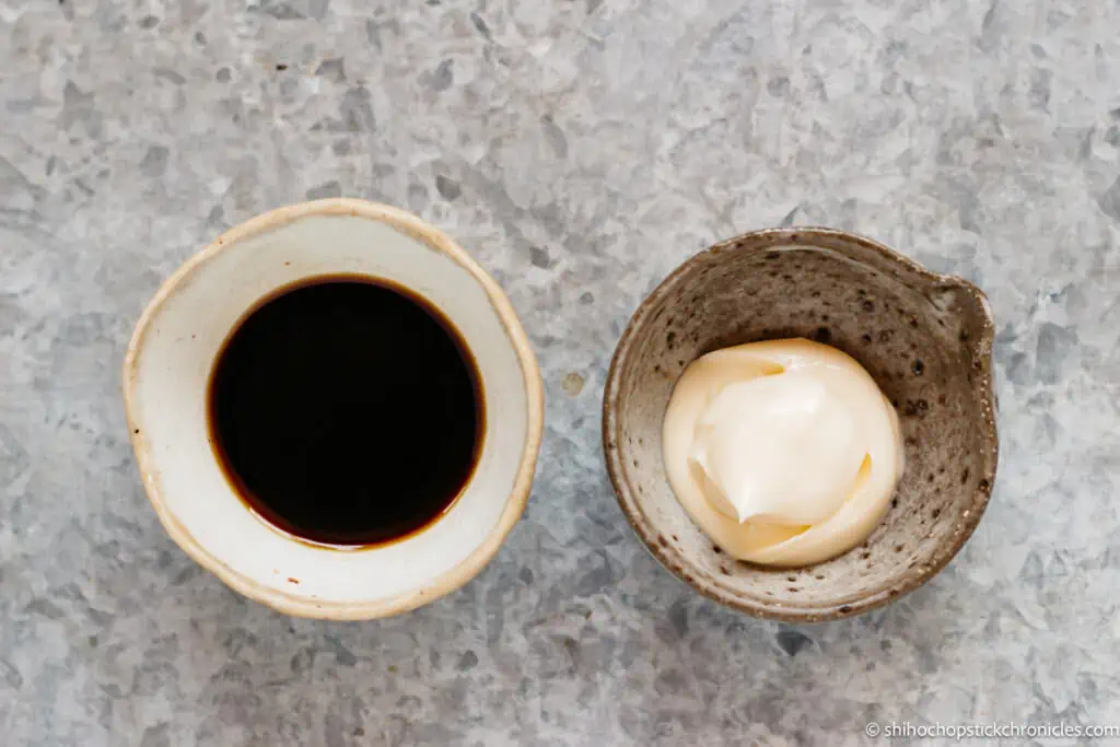 soy sauce and Japanese mayonnaise in small bowls 