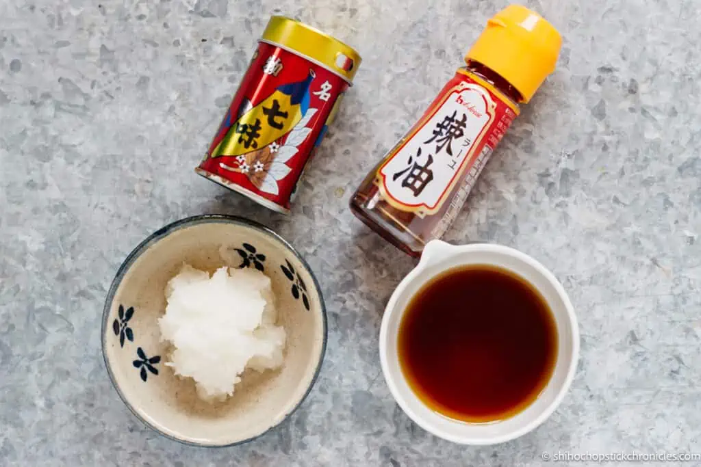 rayu chili oil and shichimi togarashi in small container, grated daikon and ponzu in small bowls