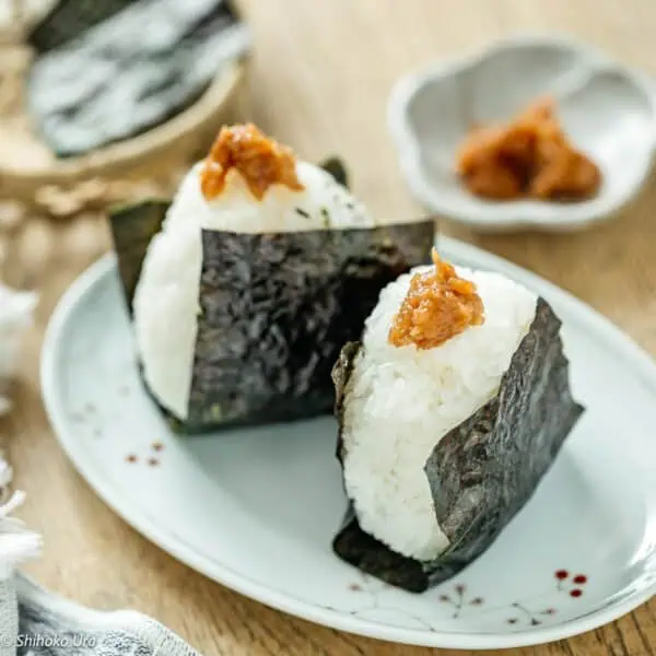 Japanese rice balls with umeboshi and nori seaweed.